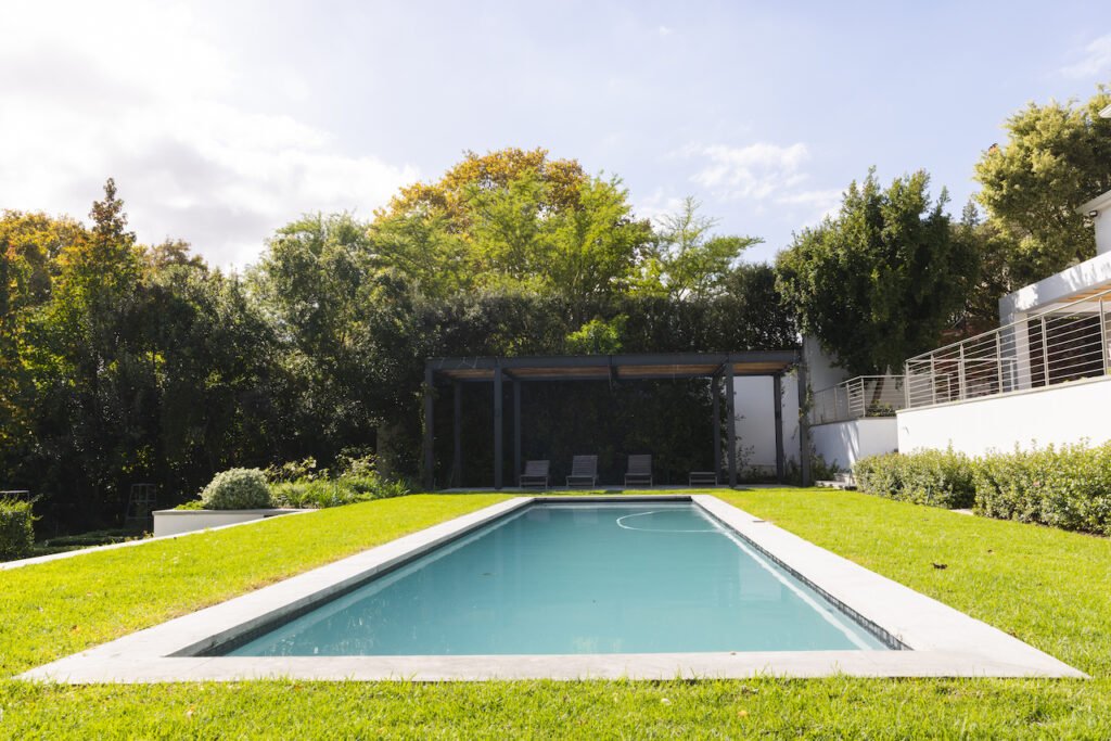 Is Your Backyard Ready for a Pool? What You Need to Know 3 pristine backyard pool