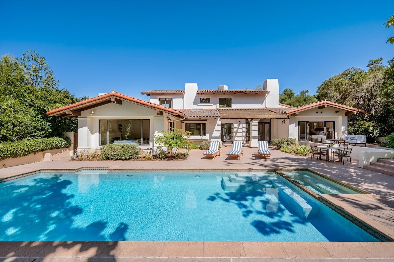 backyard concrete pool in the sunshine
